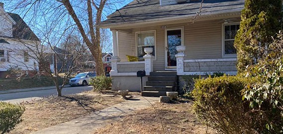 Photo of front of home with all trash removed