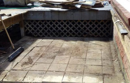 Empty concrete area on a deck after hot tub removal