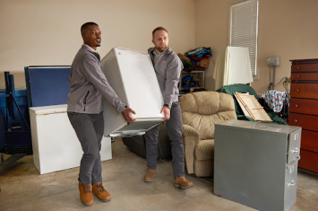 Workers carrying a box